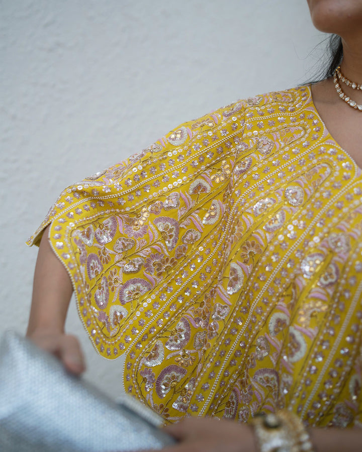 Alisha Pekha in Regal Petal-Inspired One-Shoulder Top & Tulip Skirt