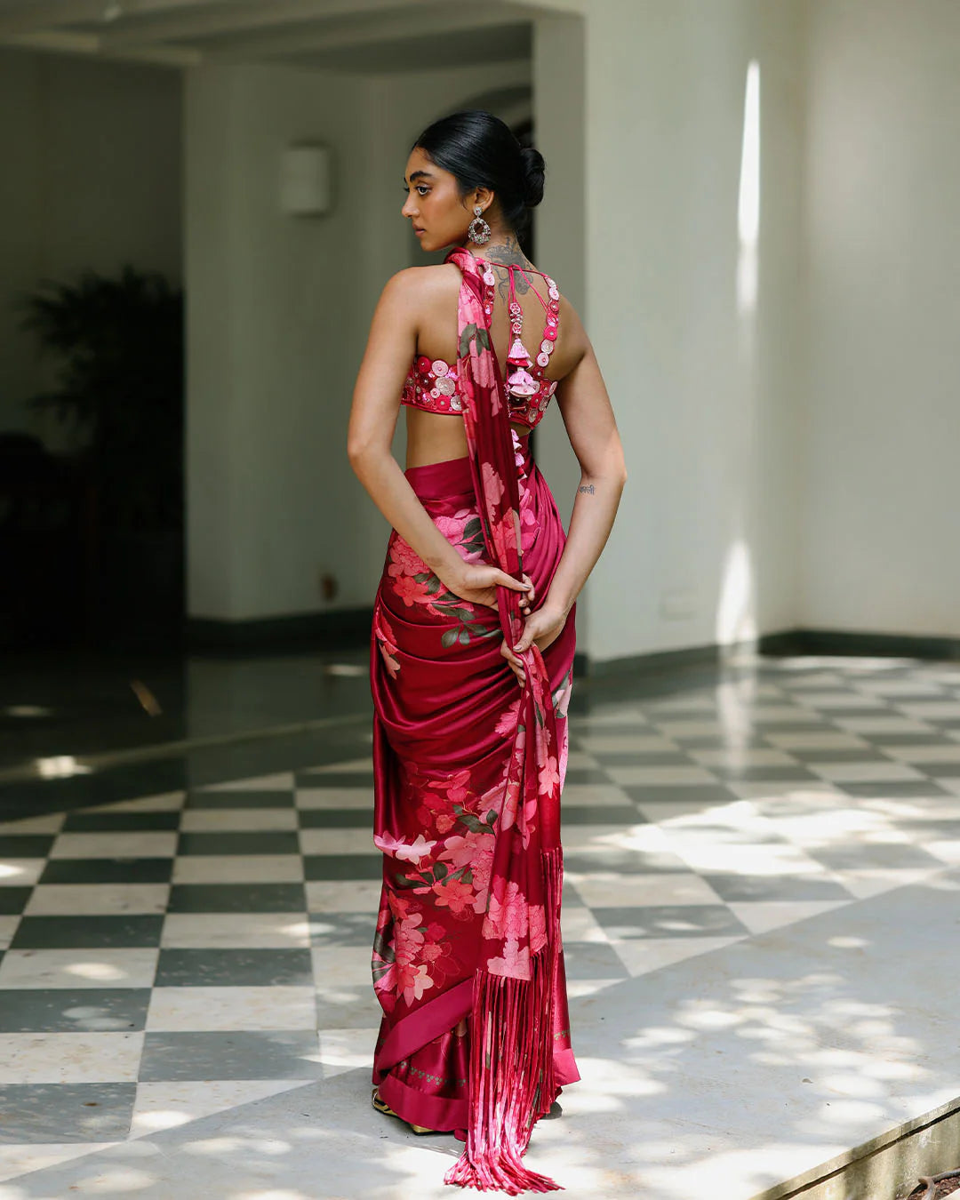 Juhi Godambe Jain in Scarlet fringe oriental bloom sari set