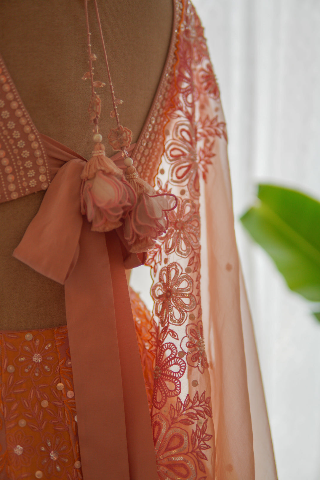 Contrasting Lilac & Orange Hand Embroidered Lehenga Set