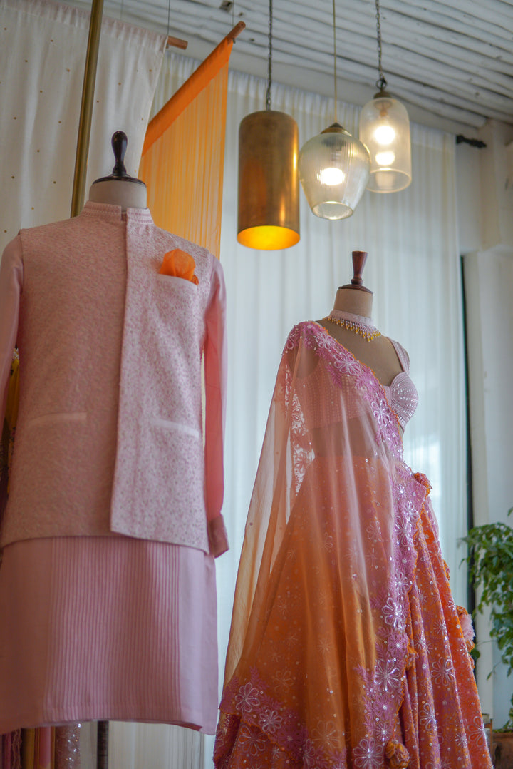 Contrasting Lilac & Orange Hand Embroidered Lehenga Set