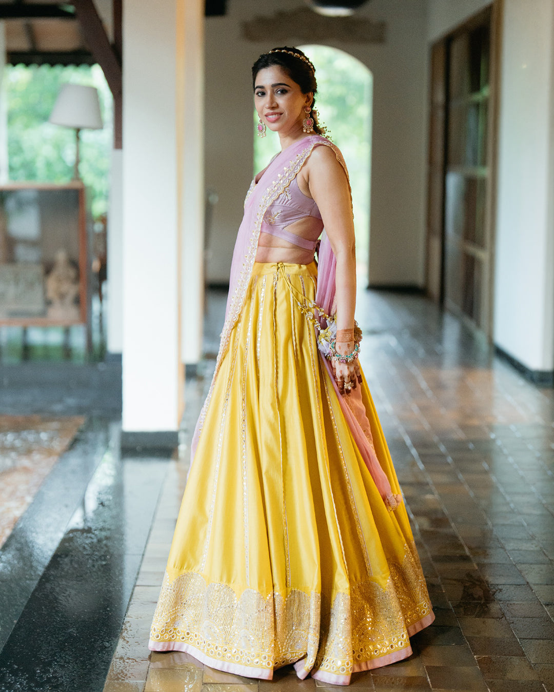 Aarti Ravi in hand-embroidered ochre lehenga set