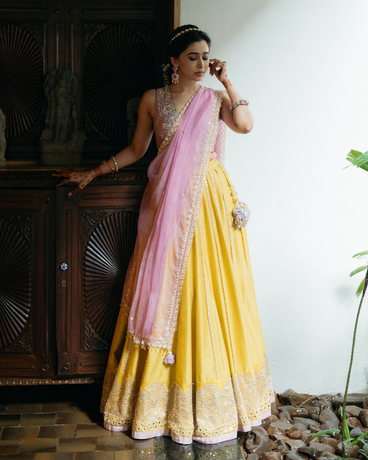 Aarti Ravi in hand-embroidered ochre lehenga set