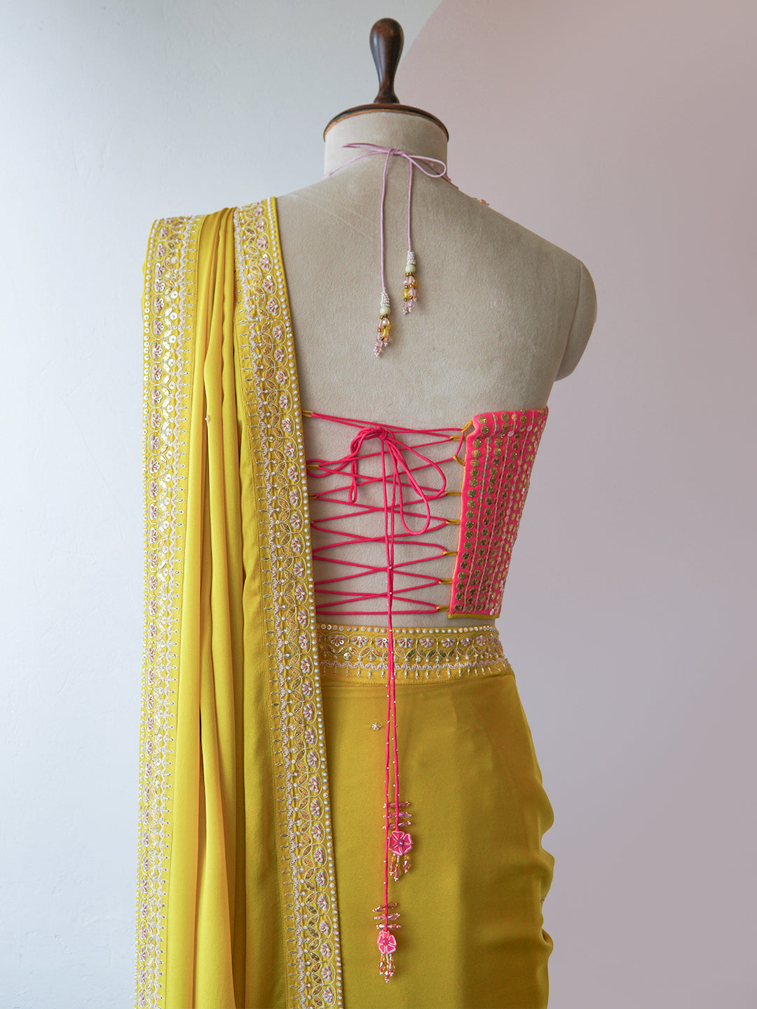 OCHRE SAREE WITH HOT PINK CORSET