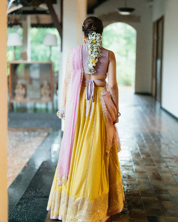 Aarti Ravi in hand-embroidered ochre lehenga set