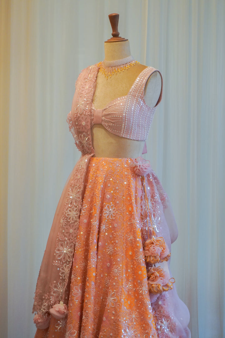 Contrasting Lilac & Orange Hand Embroidered Lehenga Set