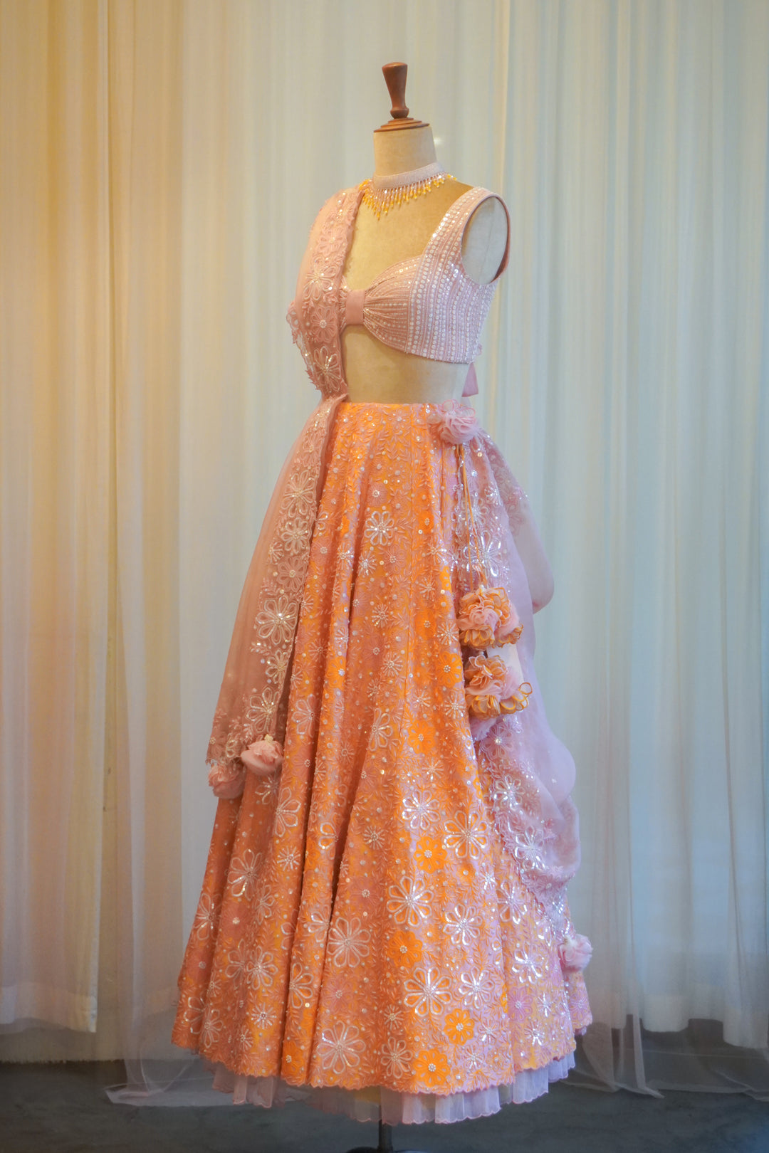 Contrasting Lilac & Orange Hand Embroidered Lehenga Set