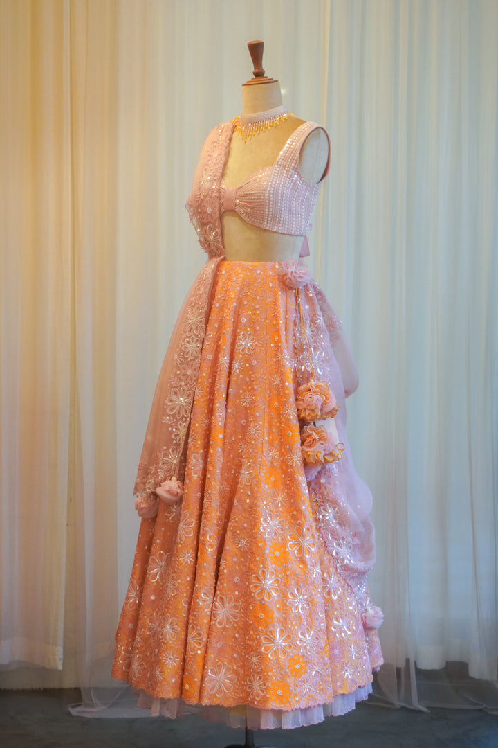 Contrasting Lilac & Orange Hand Embroidered Lehenga Set
